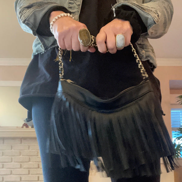 pleather, black fringe purse with woven, gold chain shoulder strap in black